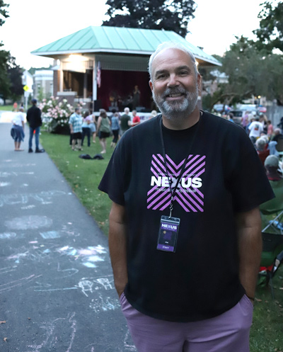 Lebanon Opera House Executive Director Joe Cliffordstands in front of the Colburn Park bandshell Sunday night.