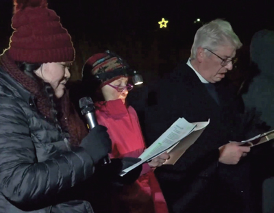 Angela Zhang of LISTEN Community Services speaking at the 2023 vigil.